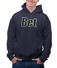 Load image into Gallery viewer, The design is the word Bet, written in black lettering with a white outline. Printed on a classic navy blue hoodie.