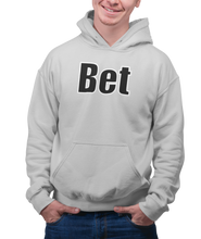 Load image into Gallery viewer, The design is the word Bet, written in black lettering with a white outline. Printed on a classic athletic grey hoodie.