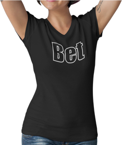 The design is the word Bet, written in black lettering with a white outline. Printed on a well-fitted black v-neck ladies tee.  Edit alt text