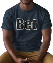 Load image into Gallery viewer, The design is the word Bet, written in black lettering with a white outline. Printed on a simply great true navy tee.