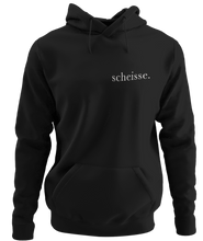 Load image into Gallery viewer, The design is the word scheisse. in white lettering. The design is printed on the left side of this black classic hoodie.