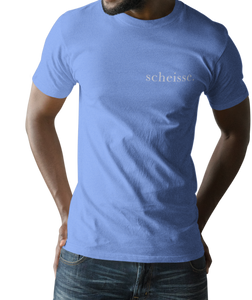 The design is the word scheisse. in white lettering. The design is printed on left side of this carolina blue simply great tee.