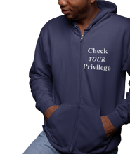 Load image into Gallery viewer, The design is the words &#39;check your privilege&#39; in white lettering. The design is printed on a navy blue zip-up hoodie to the left of the zipper.