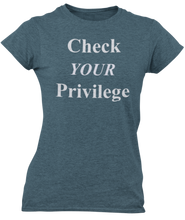 Load image into Gallery viewer, The design is the words Check Your Privilege in white lettering. The design is printed on an indigo ladies tee by Next Level.