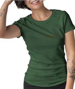 The design is the word scheisse. written in brown lettering. The design is printed on a forest green ladies tee.