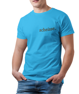 The design is the word scheisse. in brown lettering. The design is printed on the left side of the sapphire tee.