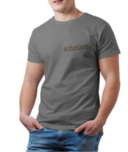 Load image into Gallery viewer, The design is the word scheisse. in brown lettering. The design is printed on the left side of the coal grey tee.