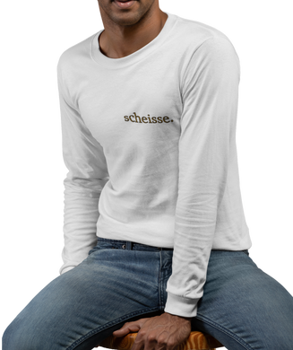 The design is the word scheisse. written in brown lettering. This design is printed over the left breast on a white long sleeve shirt.