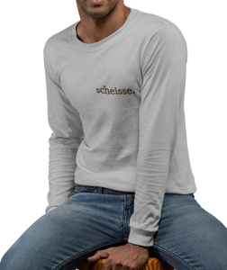 The design is the word scheisse. written in brown lettering. This design is printed over the left breast on a athletic grey long sleeve shirt.