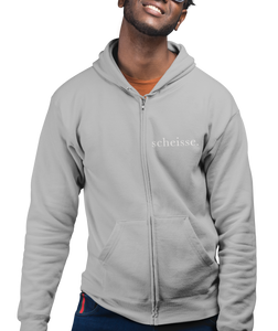 The design is the word scheisse. written in white lettering. The design is on the left side of the zipper on this athletic grey hoodie.