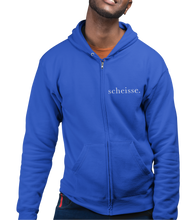 Load image into Gallery viewer, The design is the word scheisse. written in white lettering. The design is on the left side of the zipper on this true royal blue hoodie.