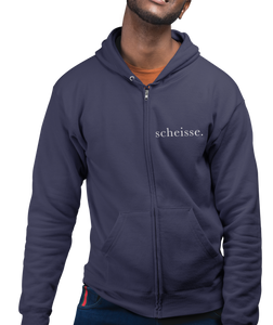 The design is the word scheisse. written in white lettering. The design is on the left side of the zipper on this true navy blue hoodie.