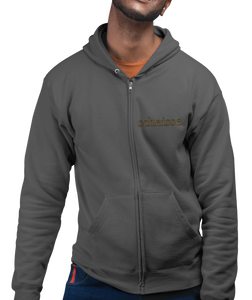 The design is the word scheisse. written in brown lettering. The design is on the left side of the zipper on this charcoal heather hoodie.