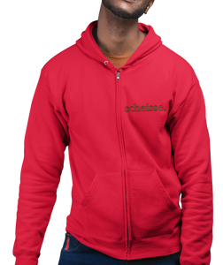 The design is the word scheisse. written in brown lettering. The design is on the left side of the zipper on this true red hoodie.