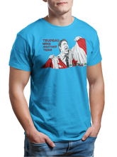 Load image into Gallery viewer, This design is Prime Minister Justin Trudeau ripping the Canadian flag. Trudeau Wins Another Term is written in red on the left side. This design is printed on a sapphire simply great tee